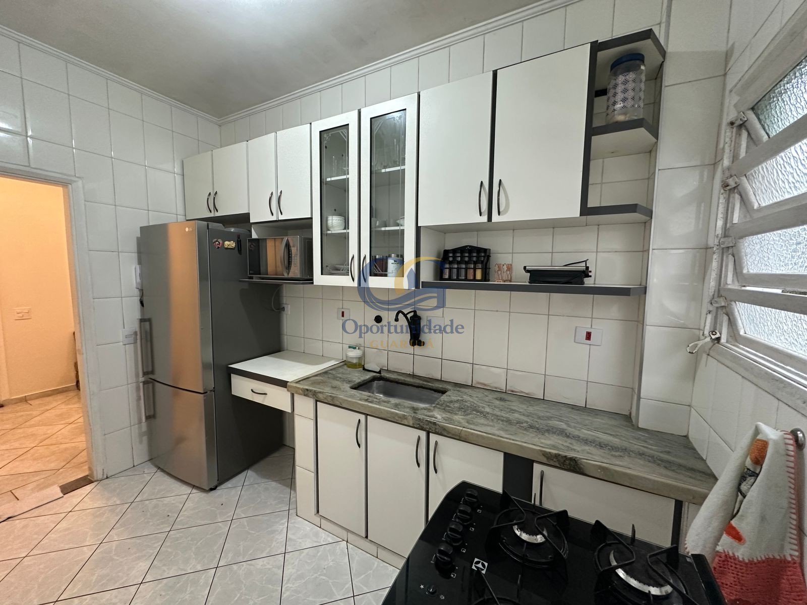 Apartamento na Praia das Pitangueiras, Guarujá - SP