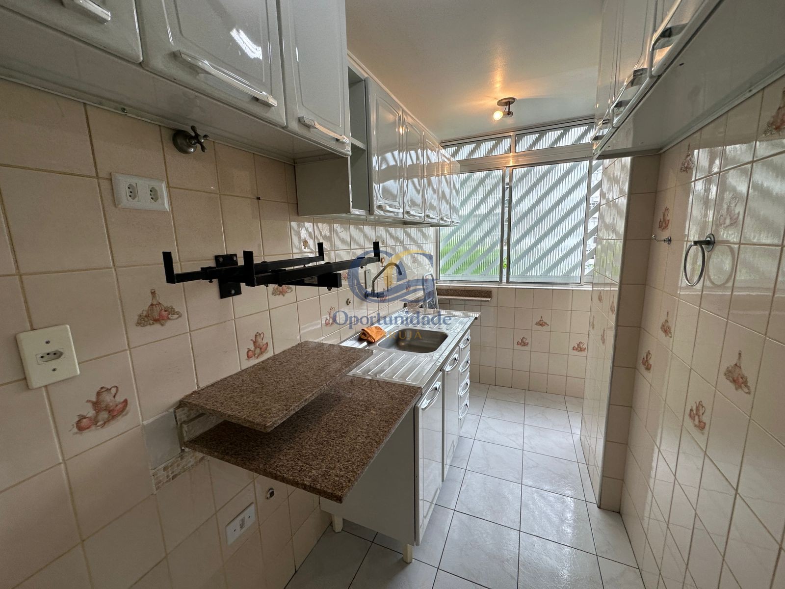 Apartamento na Praia das Pitangueiras, Guarujá - SP