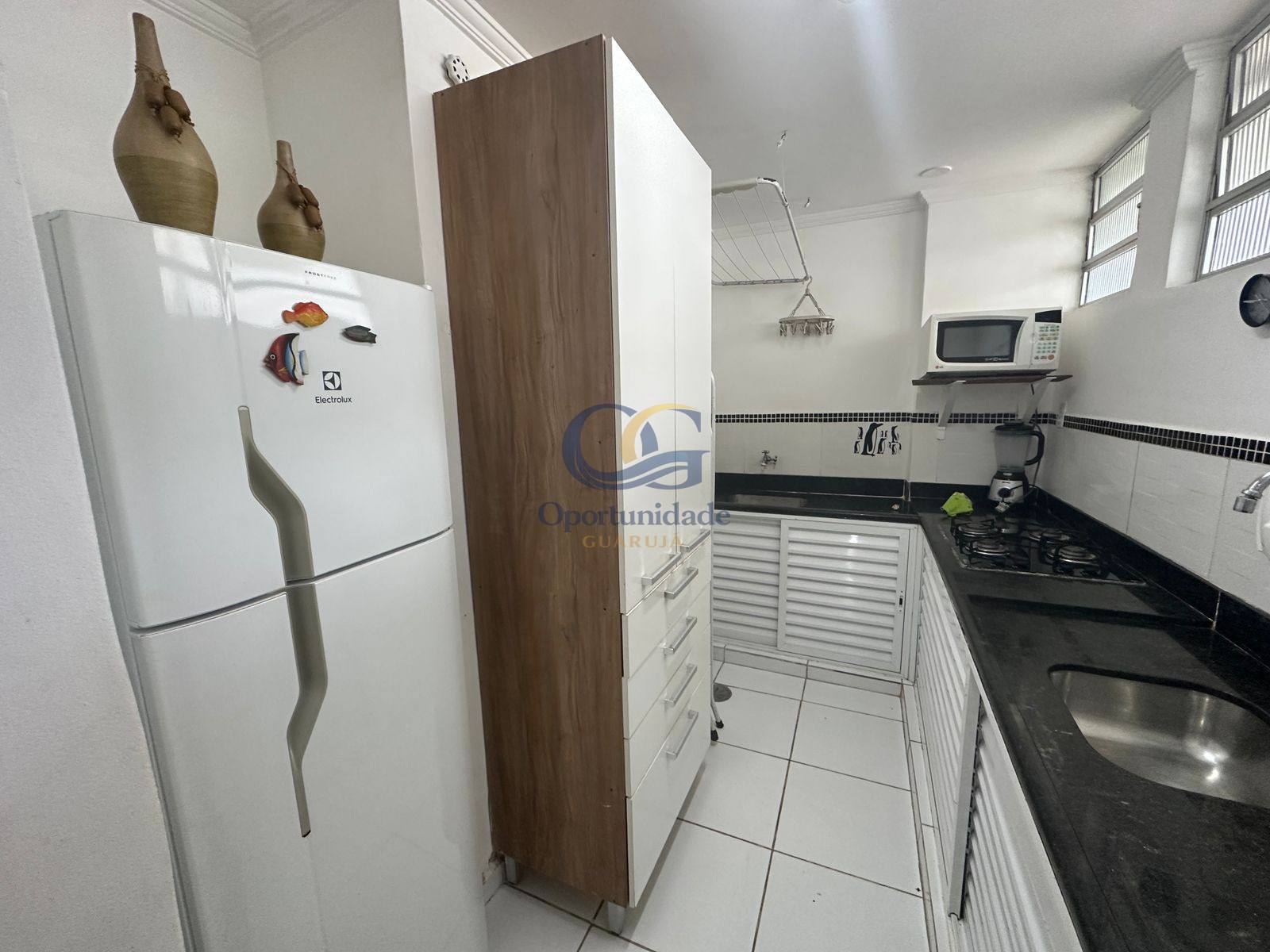 Apartamento na Praia das Pitangueiras, Guarujá - SP