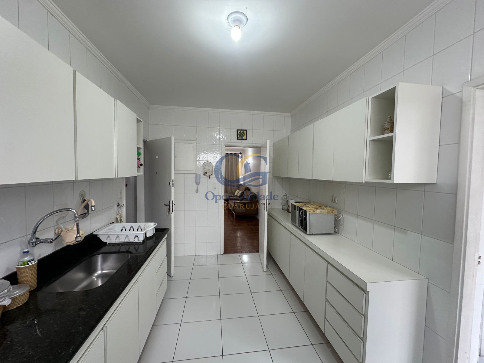 Apartamento na Praia das Pitangueiras, Guarujá - SP